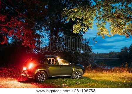 Gomel, Belarus - September 29, 2018: Car Renault Duster Suv In Autumn Night Forest. Duster Produced 