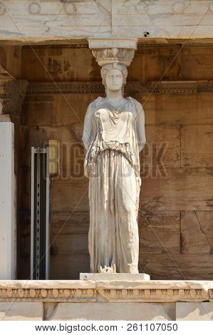 Beautiful Sphinx On The Erechtheum Facade Known As The Caryatids At The Athens Acroplis. History, Ar