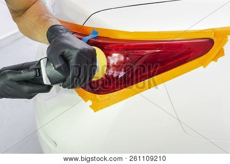 Car Polish Wax Worker Hands Holding Polisher And Polish. Close Up At Hand Holding Car Polisher. Man 