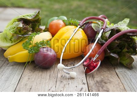 Sthetoscope And Fresh Colorful Vegetables Ingredients Fo Vegan And Healthy Cooking Or Salad Making O