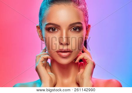 High Fashion Model Woman In Colorful Bright Lights Posing In Studio, Portrait Of Beautiful Sexy Girl