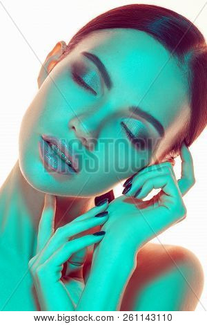 High Fashion Model Woman In Colorful Bright Lights Posing In Studio, Portrait Of Beautiful Sexy Girl
