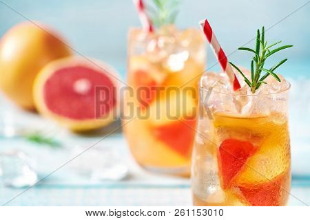 Close-up Cold Cocktail With Grapefruit And Rosemary