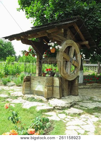 Vintage Old Wooden Water Well With Huge Giant Wheel