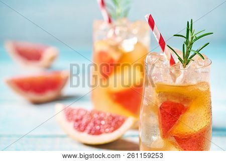 Close-up Cold Cocktail With Grapefruit And Rosemary