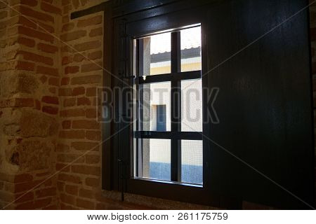 Window Of A Pub Photographed Taken Against The Light
