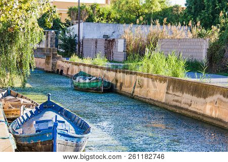 Boats In A Channel In El Palmar, Valencia, Spain