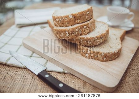 Whole Grain Wheat Bread Top View Rustic On Wooden Table Vintage Colortone