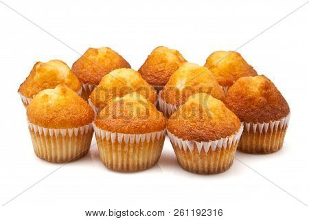 Ten Cupcakes Gold On A White Background