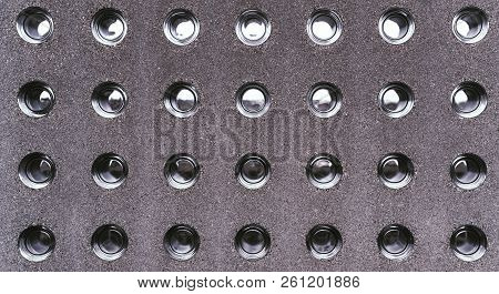 Modern Concrete Fencing With Glass Insertions; A Grainy Texture Of Contemporary Stone Block With Rou