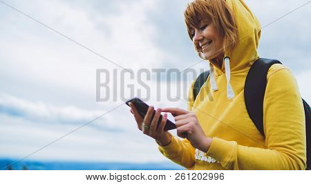 Woman Holding In Female Hands Gadget Technology, Tourist Young Girl On Backgroundblu Sky Using Mobil