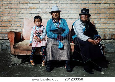 Labrang Monastery, Xiahe, Gansu Province / China - Jun 6 2011: Tibetan Buddhist Pilgrim Woman And A 
