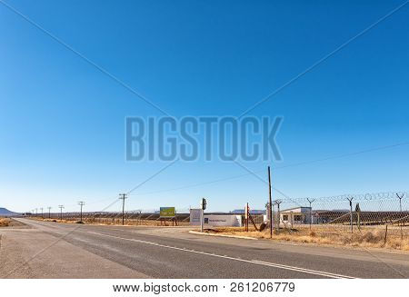 De Aar, South Africa, August 6, 2018: The Entrance To A Solar Power Station Near De Aar In The North