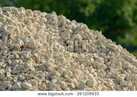 Breakstone background. Road gravel. Gravel texture. Crushed Gravel background. Piles of limestone ro