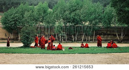 Labrang Monastery, Xiahe, Gansu Province / China - Jun 6 2011: Young Tibetan Buddhist Monks Gatherin