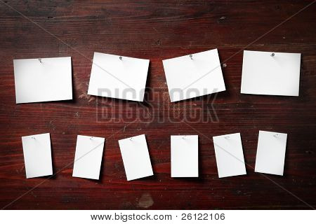 Fotopapier anfügen Nagel aus Holz Hintergrund