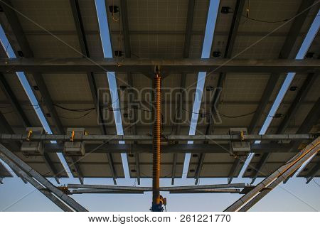 Urban Photovoltaic Panel With Solar Tracker Placed Outdoors Building. Back Devices