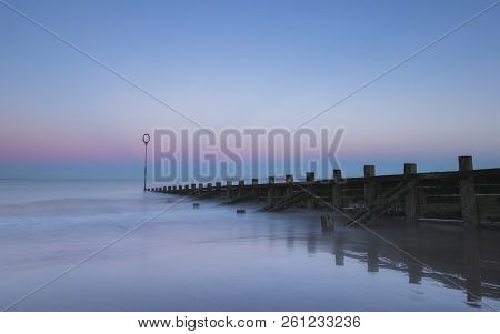 Old Wooden Groyne On Portobello Beach At Sunset
