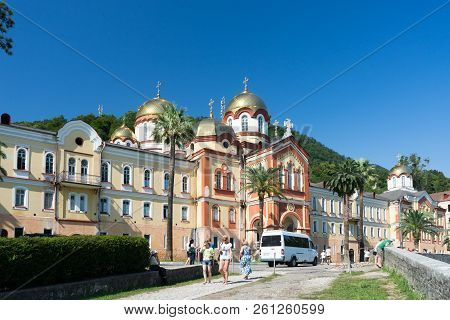 New Athos, Abkhazia-july 29, 2014: The Architecture Of The Ancient Monastery Against The Blue Sky.
