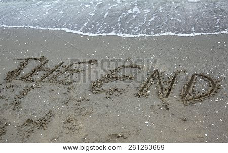 The End Text On The Beach By The Sea In Summer