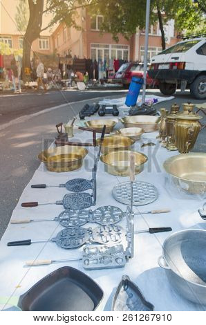 Old Copper Bowls On A Flea Market.