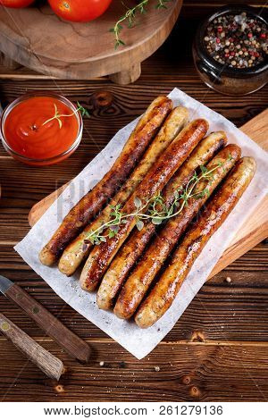 Pork Chipolata. Close-up View Of Fried Sausages. Meat Dish