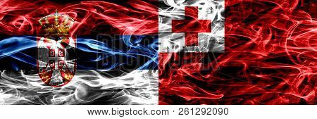 Serbia Vs Tonga, Tongan Smoke Flags Placed Side By Side. Thick Colored Silky Smoke Flags Of Serbian 