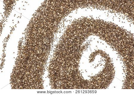 Lot Of Whole Fresh Mottled Chia Seeds Archimedean Spiral Flatlay Isolated On White Background