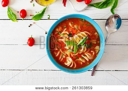 Minestrone, Italian Vegetable Soup With Pasta. Tomatoes Soup. Vegan Food. Top View. Flat Lay.