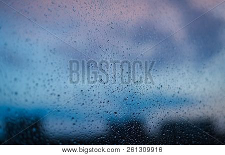 Drops Of The Rain On The Window Glass. Wet Background