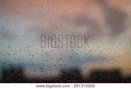 Drops Of The Rain On The Window Glass. Wet Background