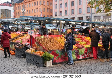 Outdoor Market Selling A Variety Of Products, Foods, And Flowers In Stockholm, Sweden