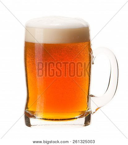Cold Mug Of Orange Beer With Foam Isolated On White Background