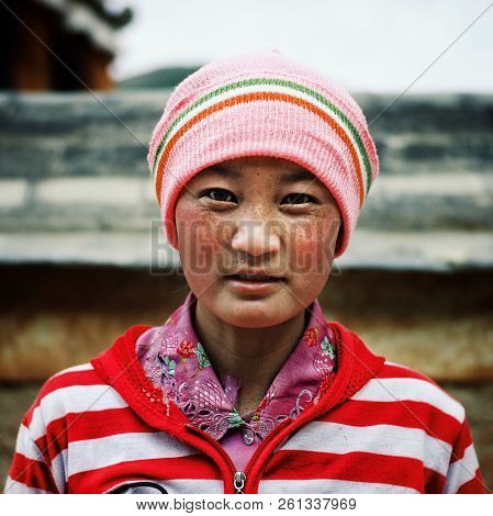 Labrang Monastery, Xiahe, Gansu Province / China - Jun 6 2011: Young Tibetan Buddhist Pilgrim Girl I