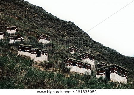 Labrang Monastery, Xiahe, Gansu Province / China - Jun 6 2011: Isolated Praying Huts Up On The Side 