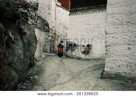 Labrang Monastery, Xiahe, Gansu Province / China - Jun 6 2011: Tibetan Buddhist Pilgrim Woman Doing 