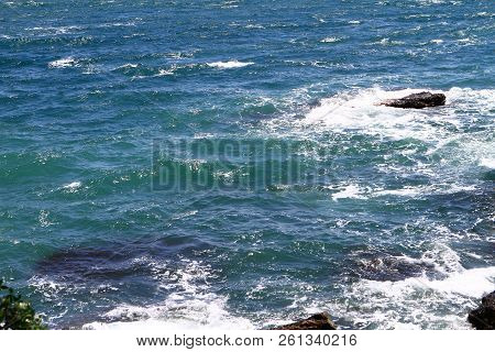 Fantastic Petrous Bright Blue Sea Beach With Large Stones On A Summer Day, Natural Landscape Photo