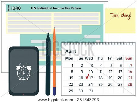 2019, 2018 Tax Form 1040, Mobile Phone, A Pen And A Calendar. Tax Day On April 17. The Calendar And 