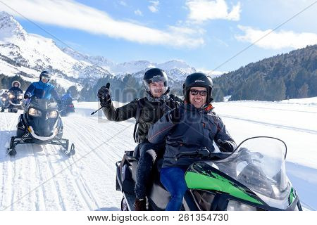 Grandvalira, Grau Roig, Andorra : March 3 2018 : Young People Driving Snowmobiles At The Grandvalira