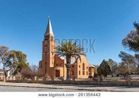 De Aar, South Africa, August 6, 2018: A Street Scene, With The Reformed Church, In De Aar In The Nor