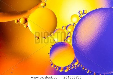 Abstract Background With Colorful Gradient Colors. Oil Drops In Water Abstract Psychedelic Pattern I