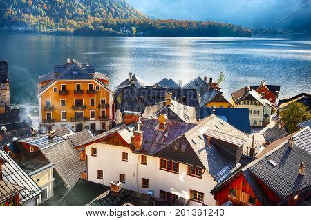 Scenic View Of Famous Hallstatt Mountain Village With Hallstatter Lake. Sunny Autumn Sunrise On Hall