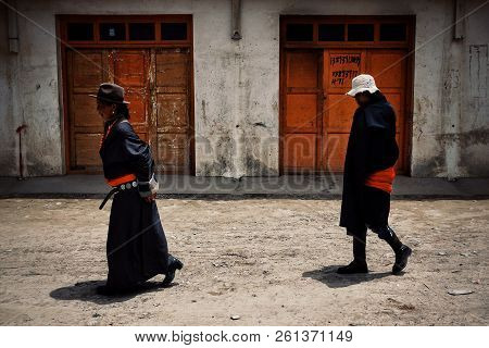 Labrang Monastery, Xiahe, Gansu Province / China - Jun 6 2011: Tibetan Buddhist Pilgrim Woman And Ma