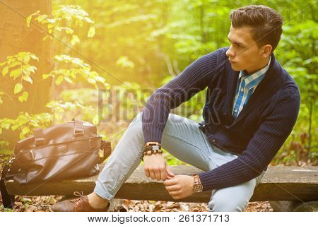 Beautiful Man Sitting On A Bench Tone