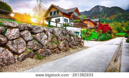 Beautiful Houses In Brauhof Village.  Misty Morning On The Lake Grundlsee Location: Resort Grundlsee