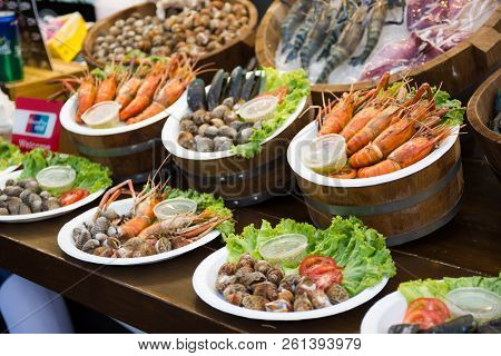 Thai Street Food Grilled Shrimps Shellfish Crab Seafood On The Table In Market Of Bangkok Thailand