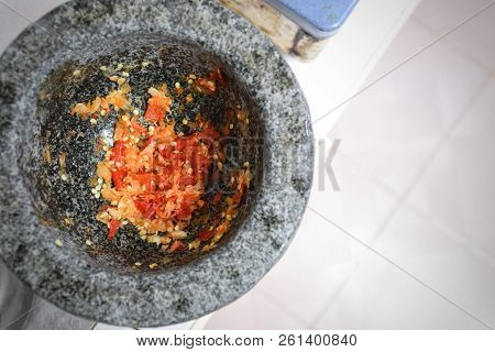 Garlic & Chilli Paste Or Red Curry For  Stir Fried Pork With Holy Basil.
