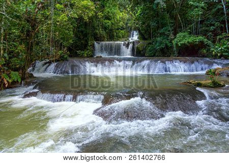 Lovely Cascading Waterfalls In The Tropical Island Of Jamaica