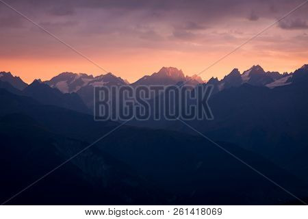 Mountain landscape. Sunset with beautiful light. Zemo Svaneti, Georgia. View from Mount Mkheer
