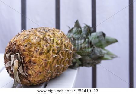 Fresh Ripe Pineapple On The White Table